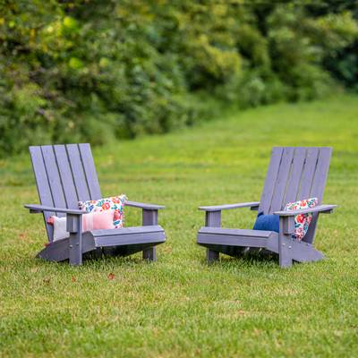 Two Jack and June Grey Stained Adult Adirondack Chairs in Backyard